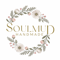 Logo for 'Soulmud Handmade' with floral elements on a white background